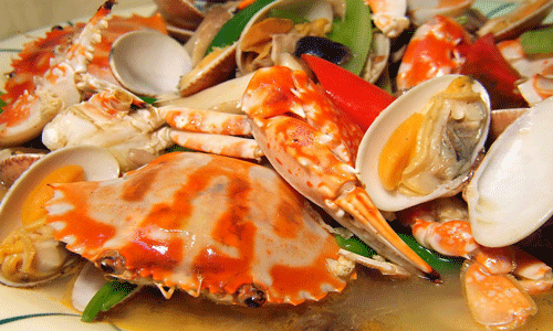 食疗常识：吃海鲜时一定要多吃这些蔬菜