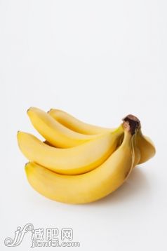 饮食,食品,健康保健,影棚拍摄,早餐_142552032_Close-up of a hand of bananas_创意图片_Getty Images China 饮食,食品,健康保健,影棚拍摄,早餐_142552032_Close-up of a hand of bananas_创意图片_Getty Images China