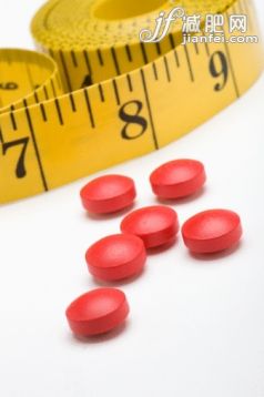 药,健康保健,影棚拍摄,室内,红色_87314715_Tape measure and diet pills_创意图片_Getty Images China 药,健康保健,影棚拍摄,室内,红色_87314715_Tape measure and diet pills_创意图片_Getty Images China