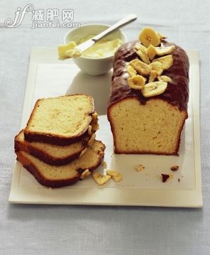 香蕉,香蕉蛋糕,面包,早餐,巧克力糖衣_gic7566568_Chocolate-coated banana bread with banana chips_创意图片_Getty Images China 香蕉,香蕉蛋糕,面包,早餐,巧克力糖衣_gic7566568_Chocolate-coated banana bread with banana chips_创意图片_Getty Images China