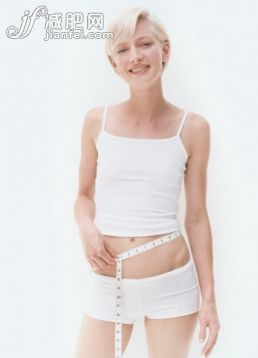 身体关注,瘦身,健康生活方式,摄影,Y50701_3513-000008_Woman Measuring Waist_创意图片_Getty Images China 身体关注,瘦身,健康生活方式,摄影,Y50701_3513-000008_Woman Measuring Waist_创意图片_Getty Images China